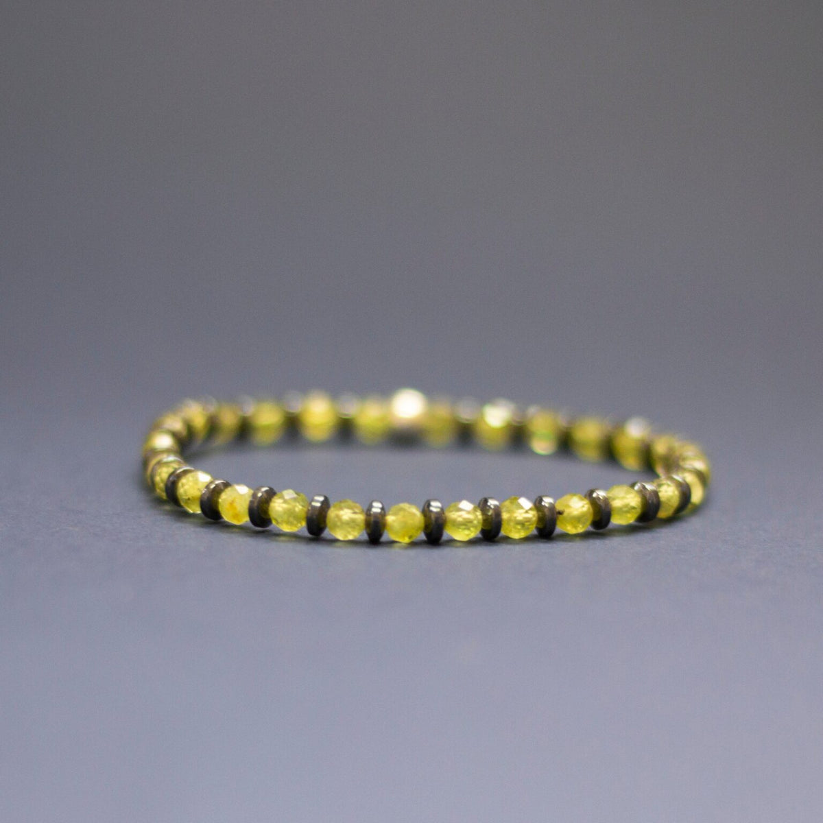 Peridot and grey Hematite Bracelet 4mm facet – Pulse Collection - Aquarius Stones